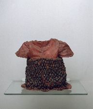 Alice Maher, Berry Dress, 1994, Rosehips, cotton, paint, sewing pins, 25 x 32 x 24 cm, Collection Irish Museum of Modern Art, Purchase, 1995
