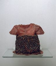 Alice Maher, Berry Dress, 1994, Rosehips, cotton, paint, sewing pins, 25 x 32 x 24 cm, Collection Irish Museum of Modern Art, Purchase, 1995 Alice Maher, Berry Dress, 1994, Rosehips, cotton, paint, sewing pins, 25 x 32 x 24 cm, Collection Irish Museum of Modern Art, Purchase, 1995