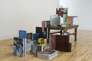 Carolos Garaicoa, Mi biblioteca personal crece conjuntamente con mis principios políticos. My Personal Library Grows-up Together with My Political Principles, 2008, books, mini-DV videos, mp4 players, wood, Courtesy Galleria Continua, San Gimignano / Beijing / Le Moulin, Photo by Oak Taylor-Smith Carolos Garaicoa, Mi biblioteca personal crece conjuntamente con mis principios políticos. My Personal Library Grows-up Together with My Political Principles, 2008, books, mini-DV videos, mp4 players, wood, Courtesy Galleria Continua, San Gimignano / Beijing / Le Moulin, Photo by Oak Taylor-Smith