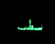 Dorothy Cross, Ghost Ship, 1999, Documentation of Nissan Art Project in association with IMMA, 1999: two light ship models, phosphorescent paint, and u.v. lights, DVD, 10 mins, looped, 90 x 38 x 18 cm, Collection Irish Museum of Modern Art, Purchase Dorothy Cross, Ghost Ship, 1999, Documentation of Nissan Art Project in association with IMMA, 1999: two light ship models, phosphorescent paint, and u.v. lights, DVD, 10 mins, looped, 90 x 38 x 18 cm, Collection Irish Museum of Modern Art, Purchase
