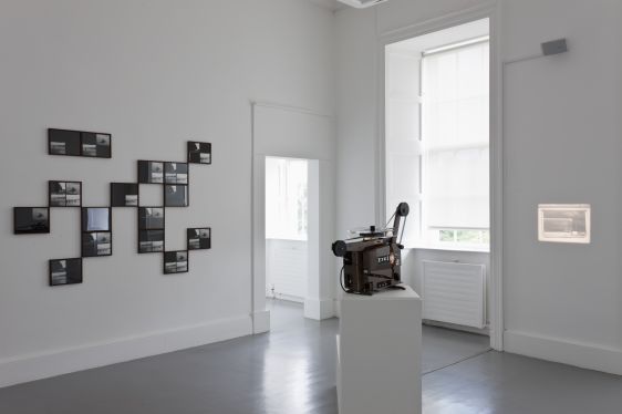 Gerard Byrne, Case Study: Loch Ness (some possibilities and problems), 2001- ongoing, Photographic elements combined in multi-various permutations, vitrines, tree stumps with accompanying wall drawings, avant garde poetry forms and experimental film. Courtesy of the artist, Installation view Irish Museum of Modern Art, Photo: Denis Mortell Gerard Byrne, Case Study: Loch Ness (some possibilities and problems), 2001- ongoing, Photographic elements combined in multi-various permutations, vitrines, tree stumps with accompanying wall drawings, avant garde poetry forms and experimental film. Courtesy of the artist, Installation view Irish Museum of Modern Art, Photo: Denis Mortell