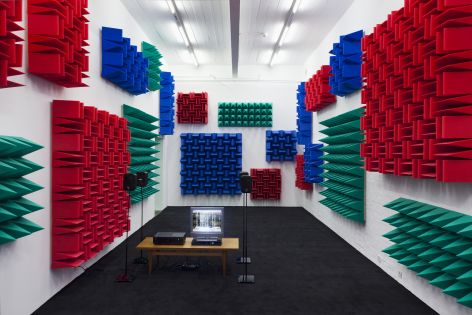 Haroon Mirza , Digital Switchover, 2012, Installation View, Kunst Halle Sankt Gallen, St.Gallen, 2012, 1 x control box, 4 x active speakers, 1 x relay, 1 x DVD player, 1 x TFT monitor, LEDs, foam Haroon Mirza , Digital Switchover, 2012, Installation View, Kunst Halle Sankt Gallen, St.Gallen, 2012, 1 x control box, 4 x active speakers, 1 x relay, 1 x DVD player, 1 x TFT monitor, LEDs, foam