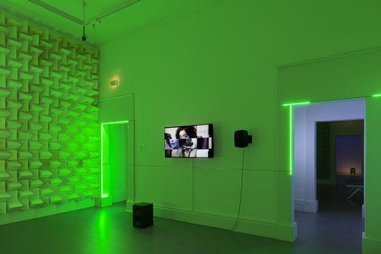 Haroon Mirza, The System, 2014, Foam, LEDs, custom multi-media player, electronics, speakers, 3 channel video, copper tape, mic cable, wire, bell, computer fan, ephemera from previous Eileen Gray exhibition. Installation View, Are jee be? Haroon Mirza, Irish Museum of Modern Art. Courtesy the artist. © Haroon Mirza Photograph by Davey Moore. Haroon Mirza, The System, 2014, Foam, LEDs, custom multi-media player, electronics, speakers, 3 channel video, copper tape, mic cable, wire, bell, computer fan, ephemera from previous Eileen Gray exhibition. Installation View, Are jee be? Haroon Mirza, Irish Museum of Modern Art. Courtesy the artist. © Haroon Mirza Photograph by Davey Moore.