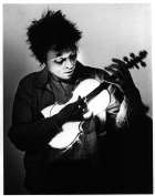 Anderson Playing the Neon Bow, 1983, black and white photograph from 'United States, 1-4' at Brooklyn Academy of Music, Brooklyn, NY. Anderson Playing the Neon Bow, 1983, black and white photograph from 'United States, 1-4' at Brooklyn Academy of Music, Brooklyn, NY.