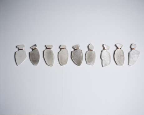 Catherine Lee, Strung Porcelain, 2004, Glazed porcelain and copper wire, total 5 x 26 x .5'' each 5 x 2.5 x .5'', 9 unique units, Courtesy of Galleri Weinberger, Copenhagen Catherine Lee, Strung Porcelain, 2004, Glazed porcelain and copper wire, total 5 x 26 x .5'' each 5 x 2.5 x .5'', 9 unique units, Courtesy of Galleri Weinberger, Copenhagen
