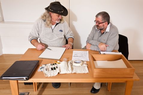 Rivane Neuenschwander, First Love, 2005, Pencil on paper, police sketch artist, table and chairs , 29 x 21 cm each, Installation view Irish Museum of Modern Art, Courtesy Inhotim Collection, Minas Gerais, Brazil, Photo © Denis Mortell Rivane Neuenschwander, First Love, 2005, Pencil on paper, police sketch artist, table and chairs , 29 x 21 cm each, Installation view Irish Museum of Modern Art, Courtesy Inhotim Collection, Minas Gerais, Brazil, Photo © Denis Mortell