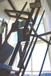 Cosmic dust #2  �opaque� Found wood, blackboard paint, chalk, framed images from magazines, dimensions variable